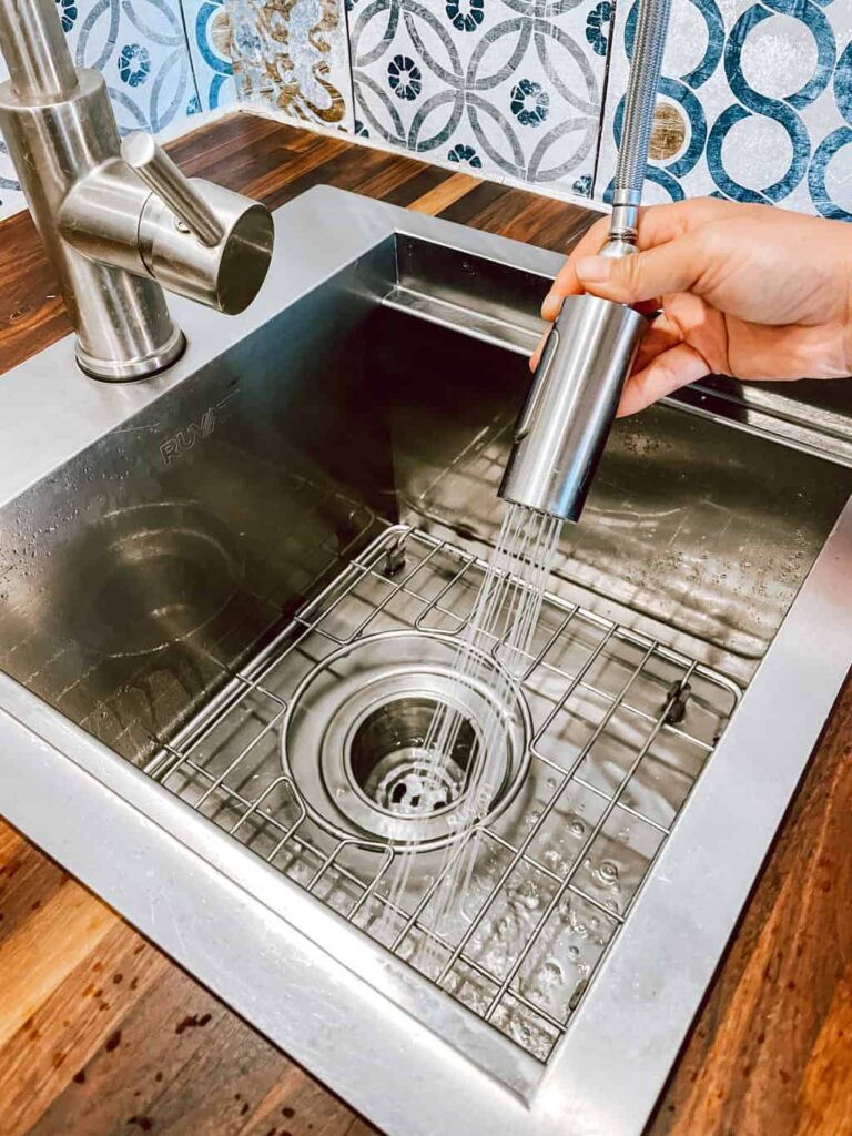 RV faucet showing off it's high pressure spray feature.