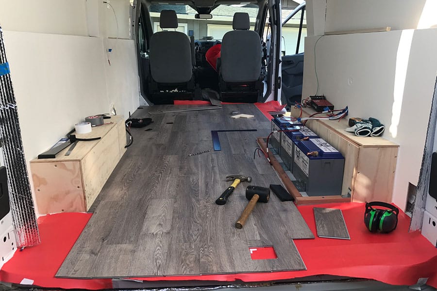 Installing luxury vinyl plank flooring in a camper van