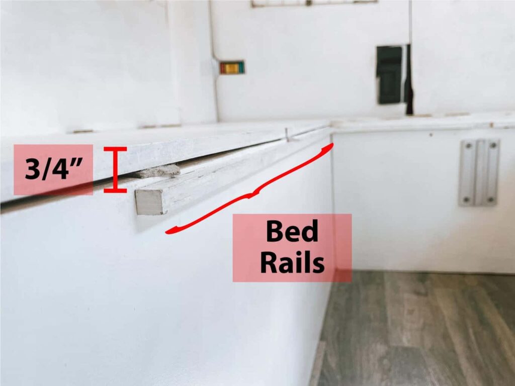 Installing bed rails along the perimeter of bed frame