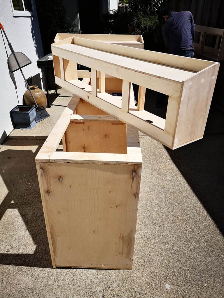 Unpainted overhead and kitchen cabinets