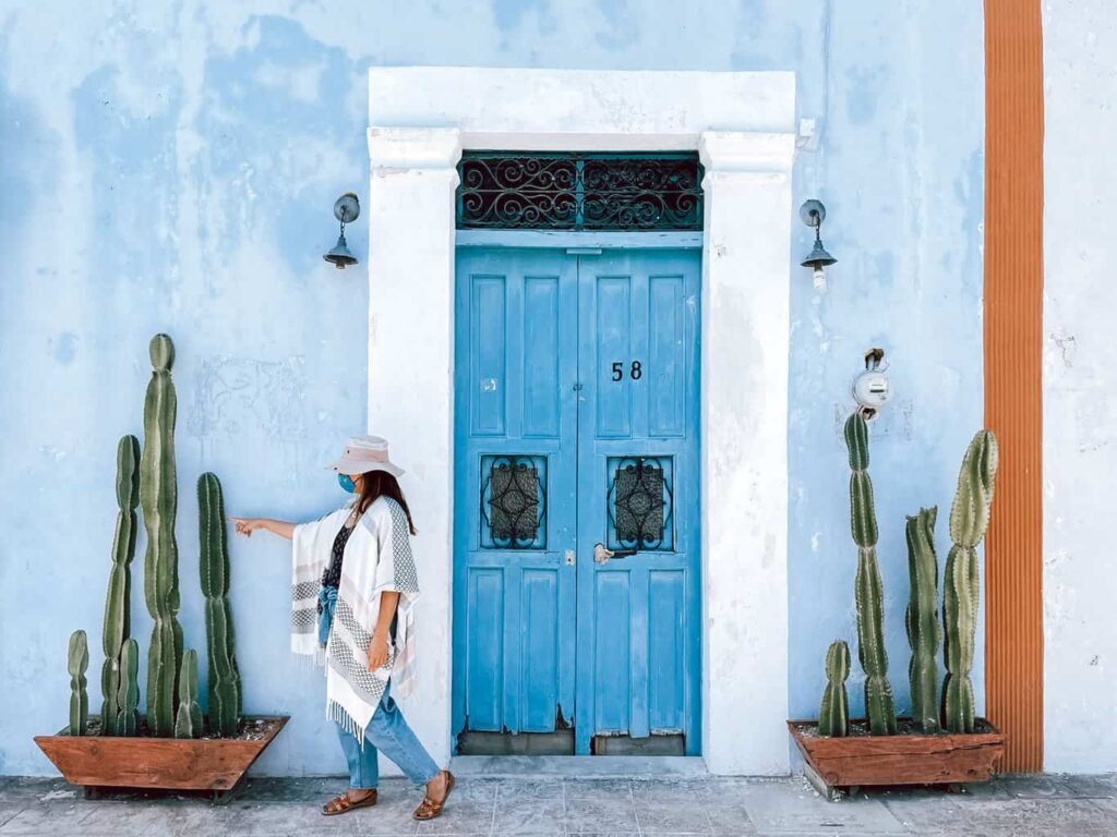 Yuko exploring the colorful homes in Campeche, Mexico