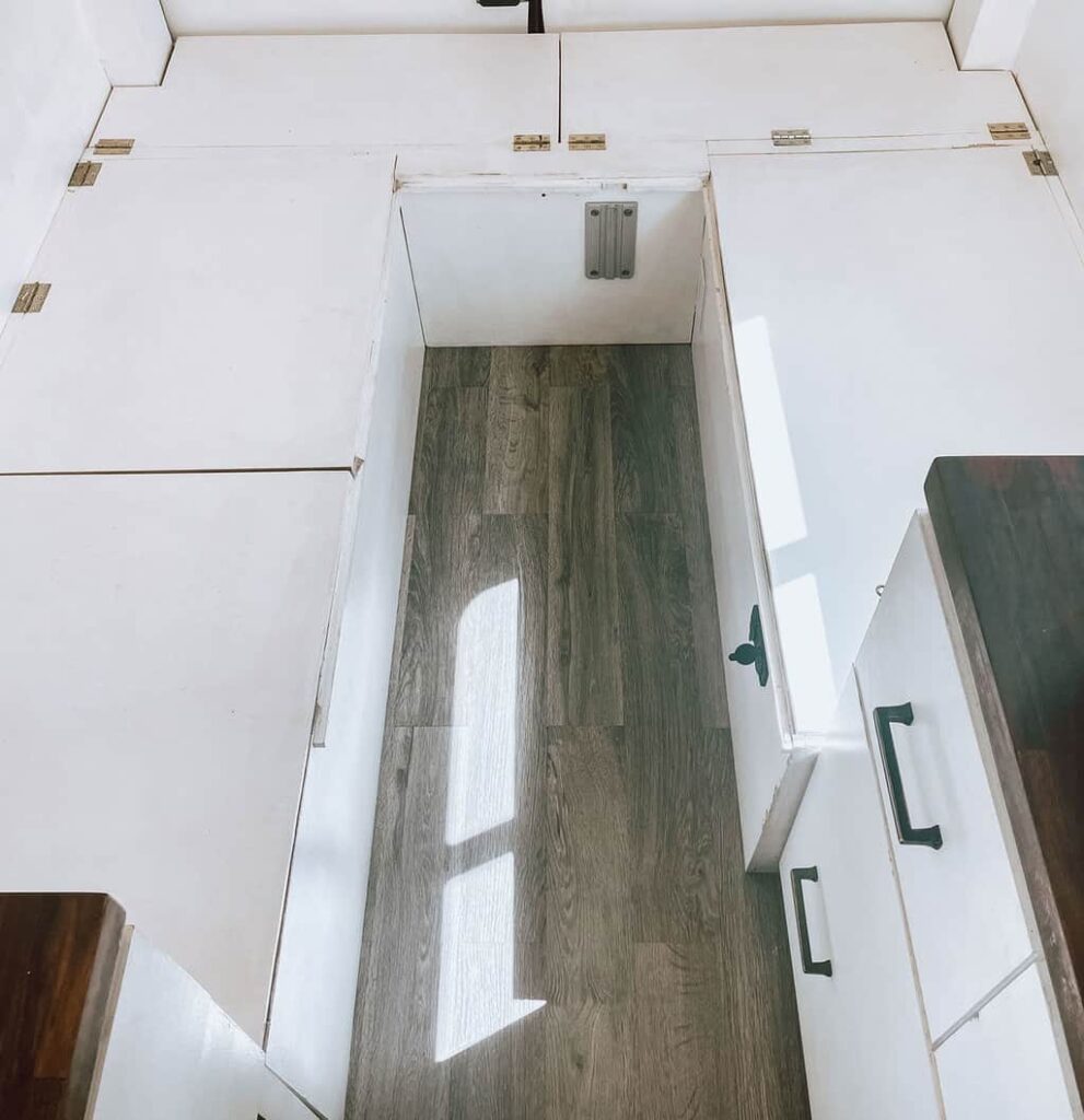 Empty space in the middle of camper van bed
