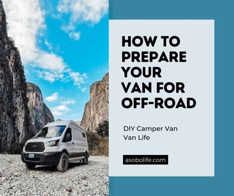 A camper van driving off-road on a gravel road inside a canyon