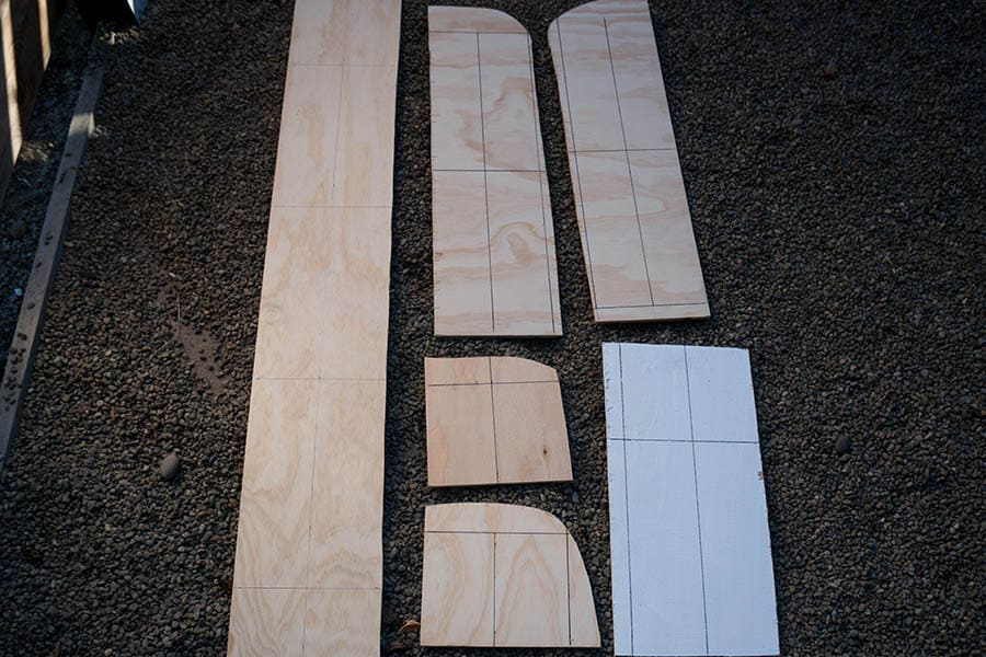 Strips of plywood laid out on the floor