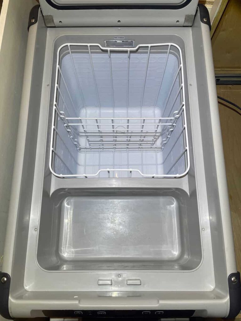 Inside view of an empty Dometic 12V fridge
