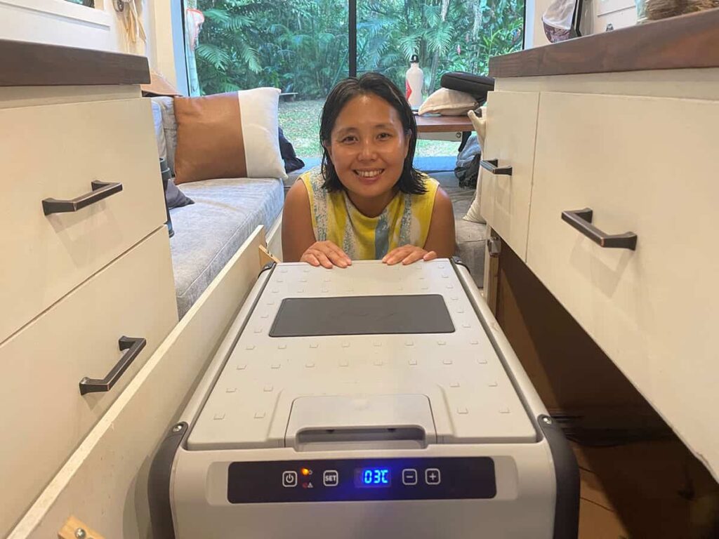 Yuko In front Of Her Dometic Fridge