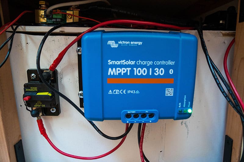 Solar charge controller next to a circuit breaker
