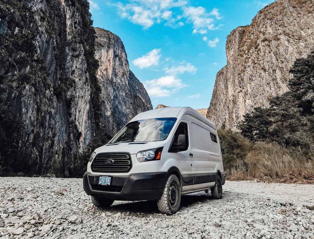 Ford Transit camper van parked in a canyon area called La Cienega De Gonzalez in Mexico