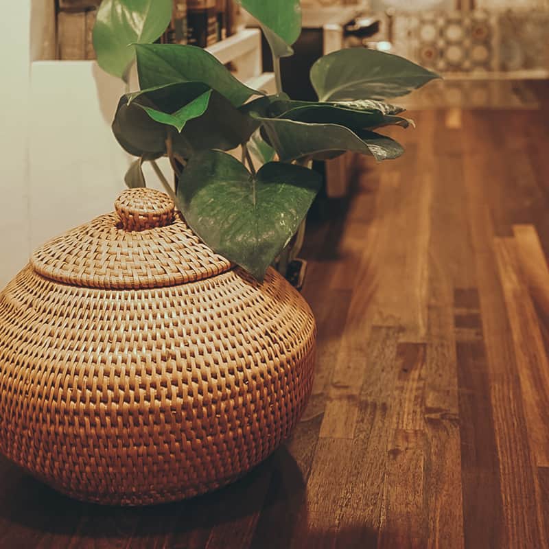 Organic wicker basket sitting on a kitchen countertop
