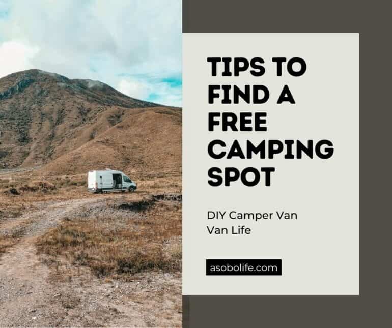 A camper van camping in a free spot on a grassy field
