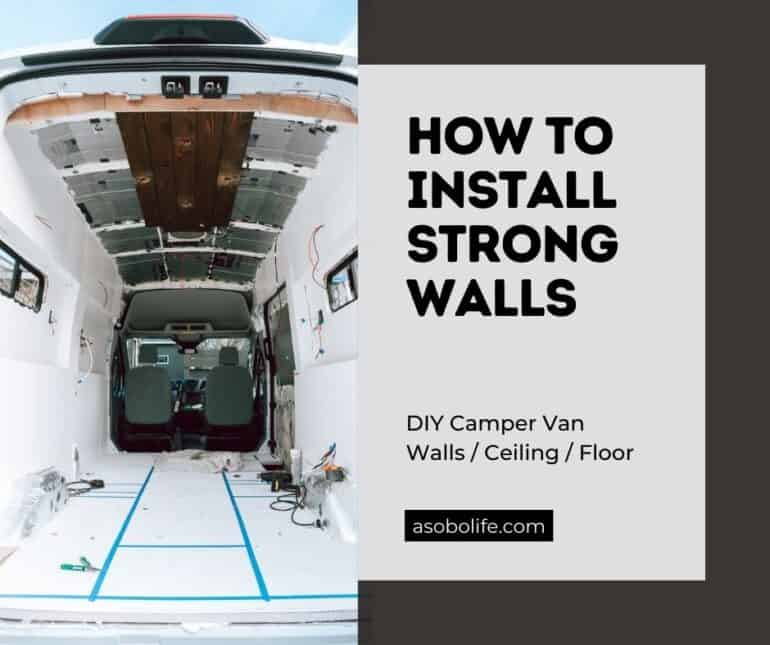White plywood walls installed inside a camper van.