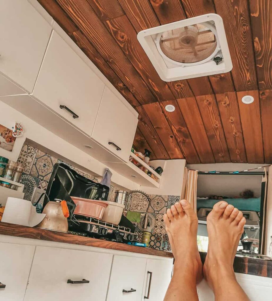 Maxxair fan cooling down a camper van and a humans feet