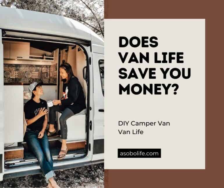 A man and a woman sharing a cup of coffee inside a camper van