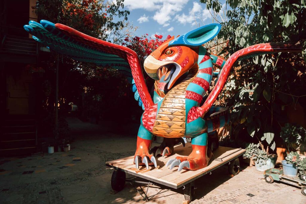 Large alebrije statue in front of Jacobo and Maria's workshop
