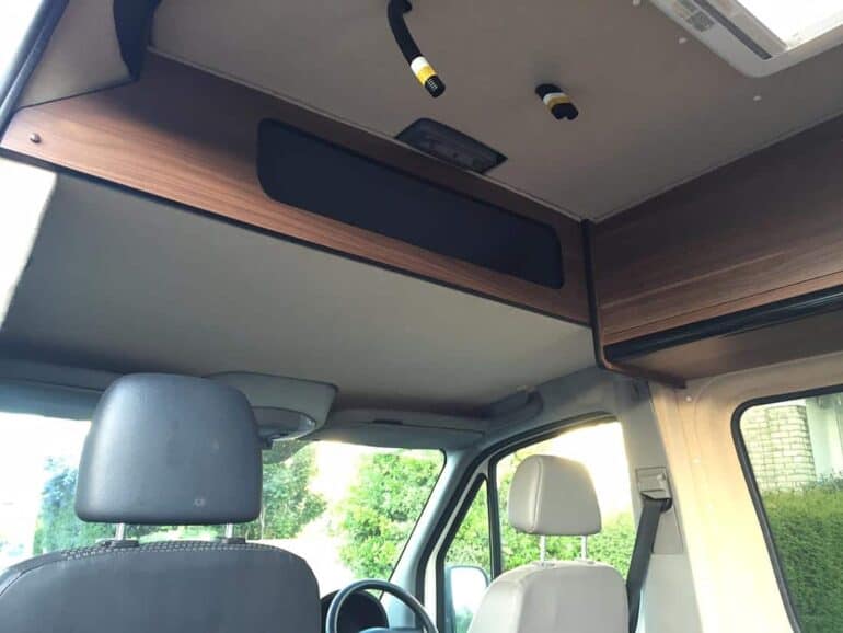 Over cab storage in a camper van