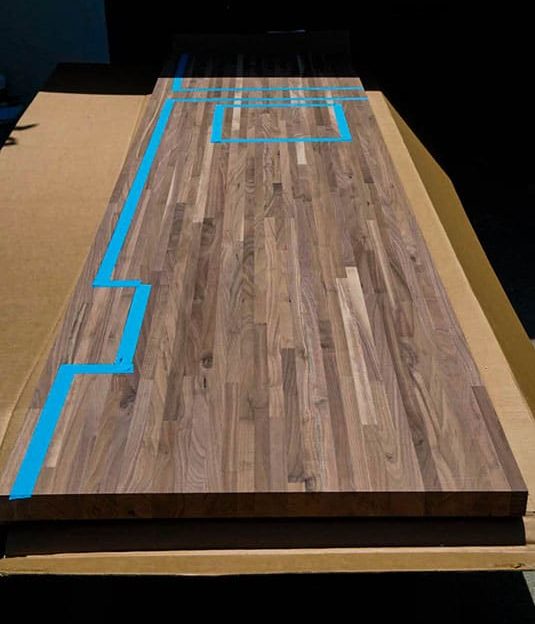 Planning countertop cut with painters tape