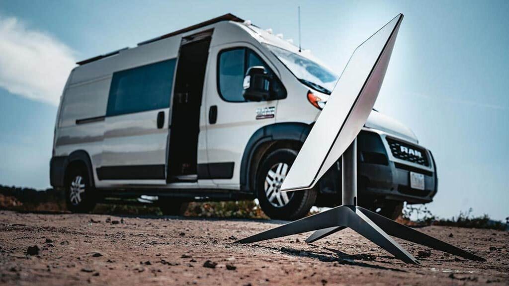 Starlink satalite next to a camper van