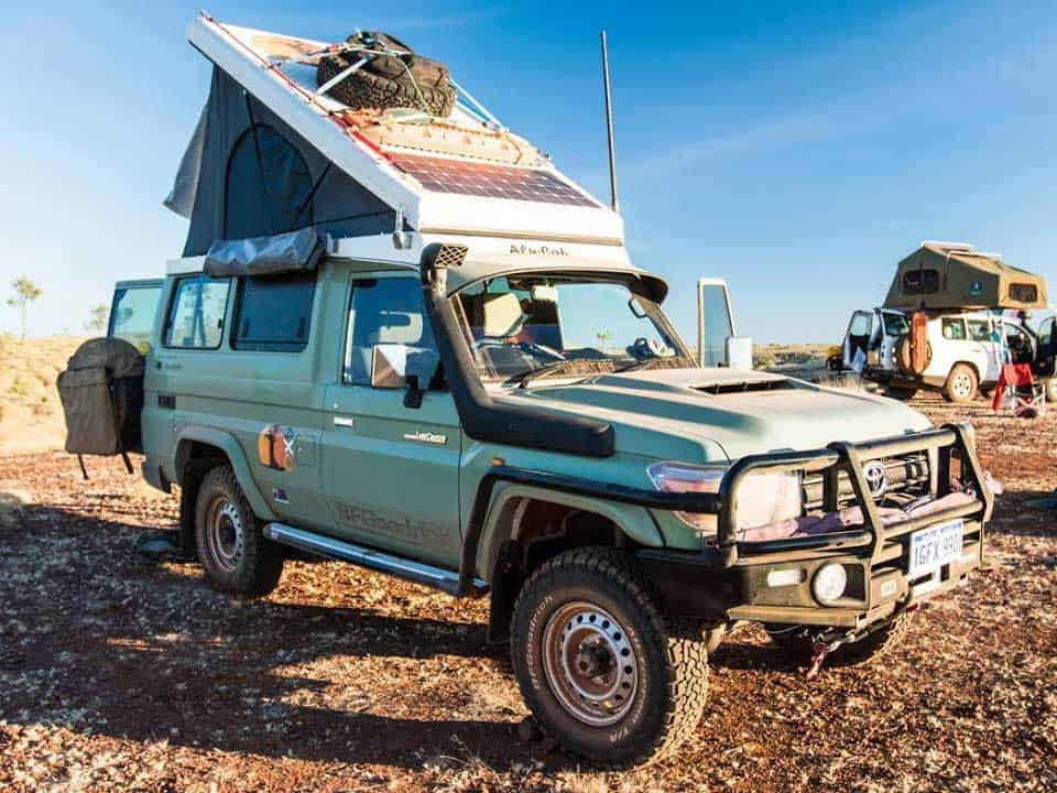 Green SUV 4x4 overland vehicle with pop top