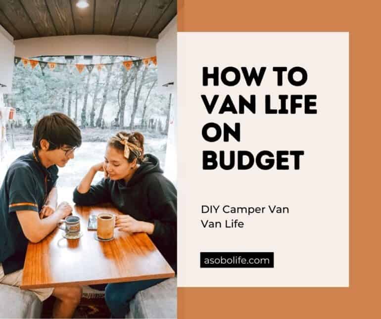 A man and a woman discussing finances inside a camper van