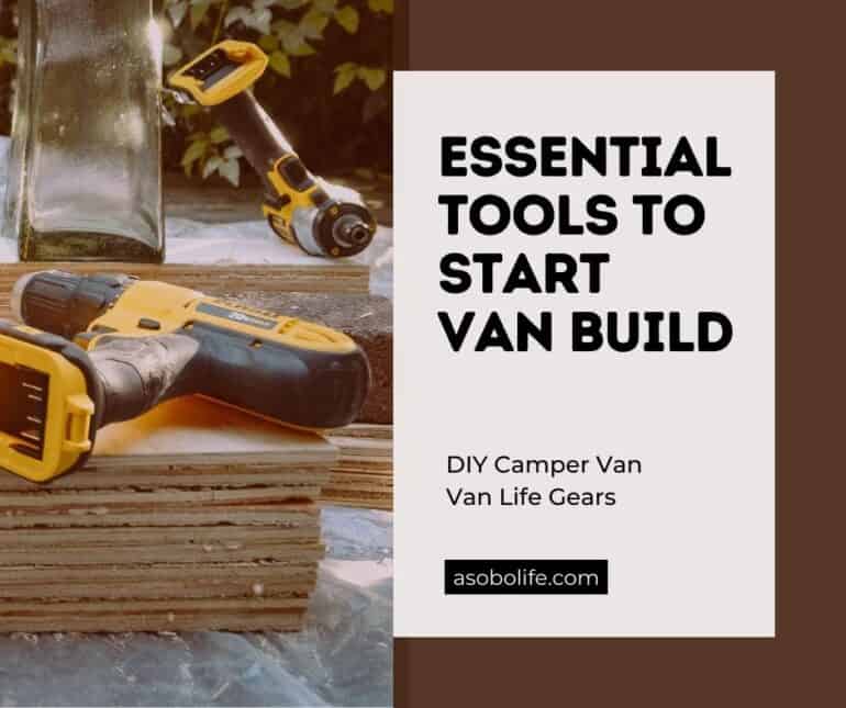 A power drill resting on some plywood used to build a camper van