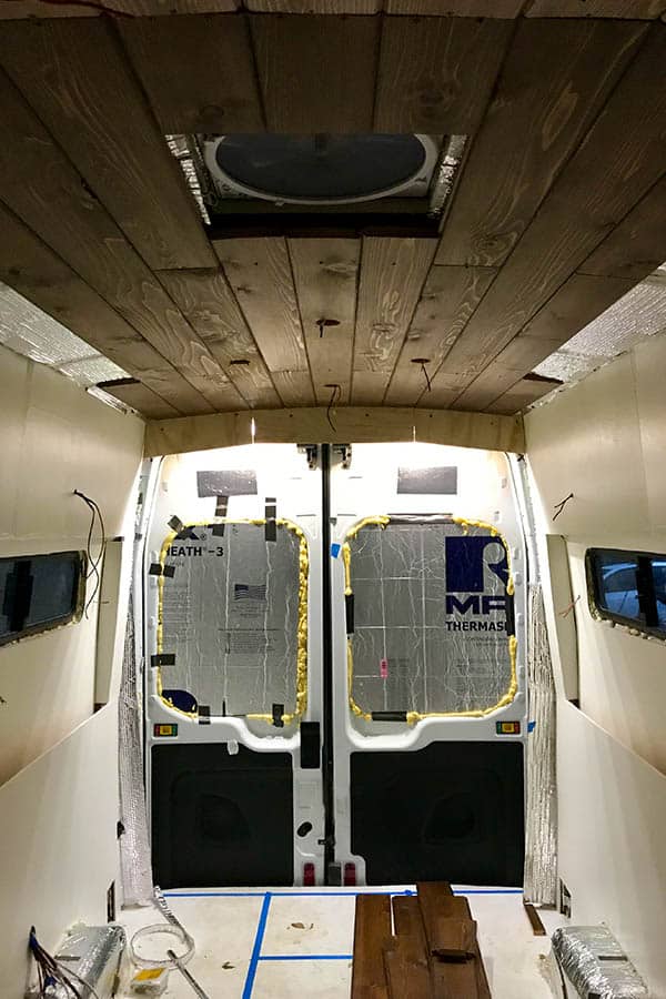 Installing ceiling boards in a camper van