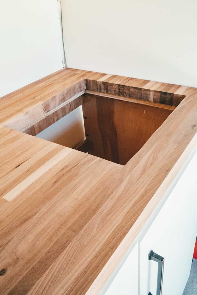 Butcher block countertop with hole for future sink installation