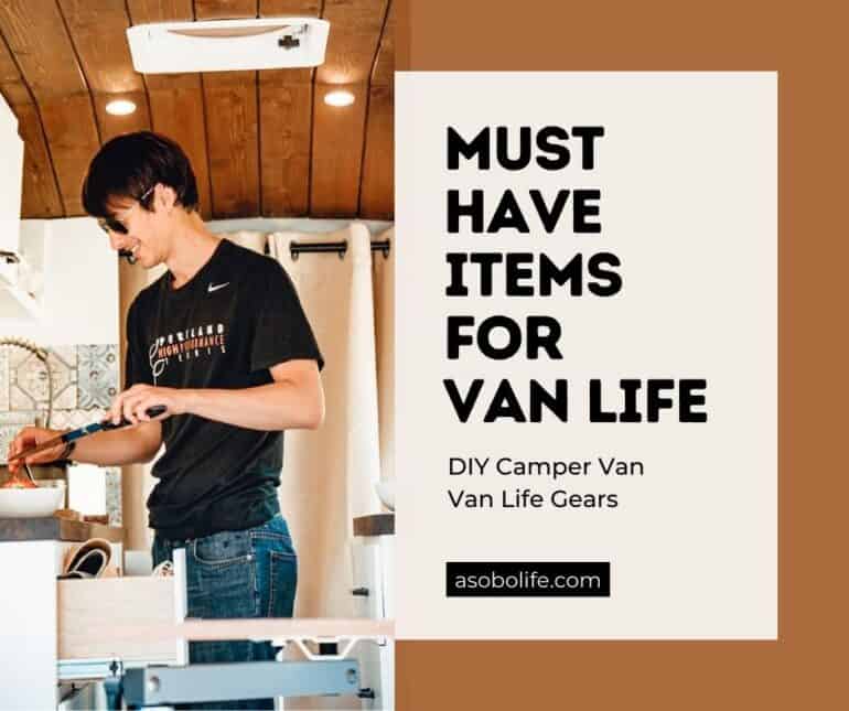 A man inside a camper van cooking a meal