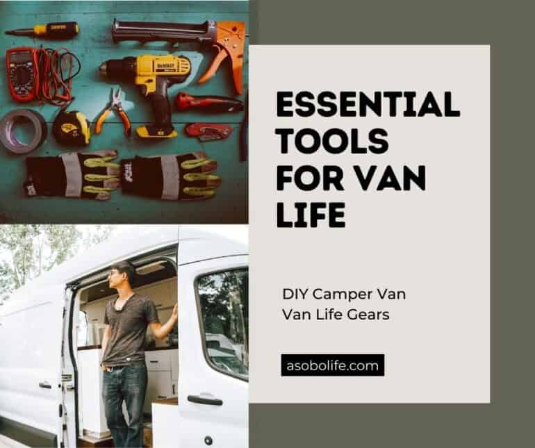 Various tools placed on a table next to a camper van