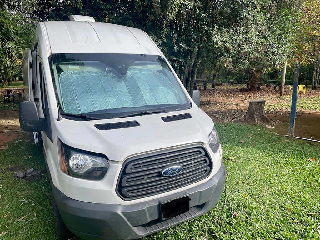Camper van with windshield sunshade